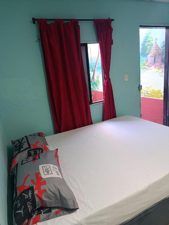 Letto o letti in una camera di Hostal Amanecer del Valle