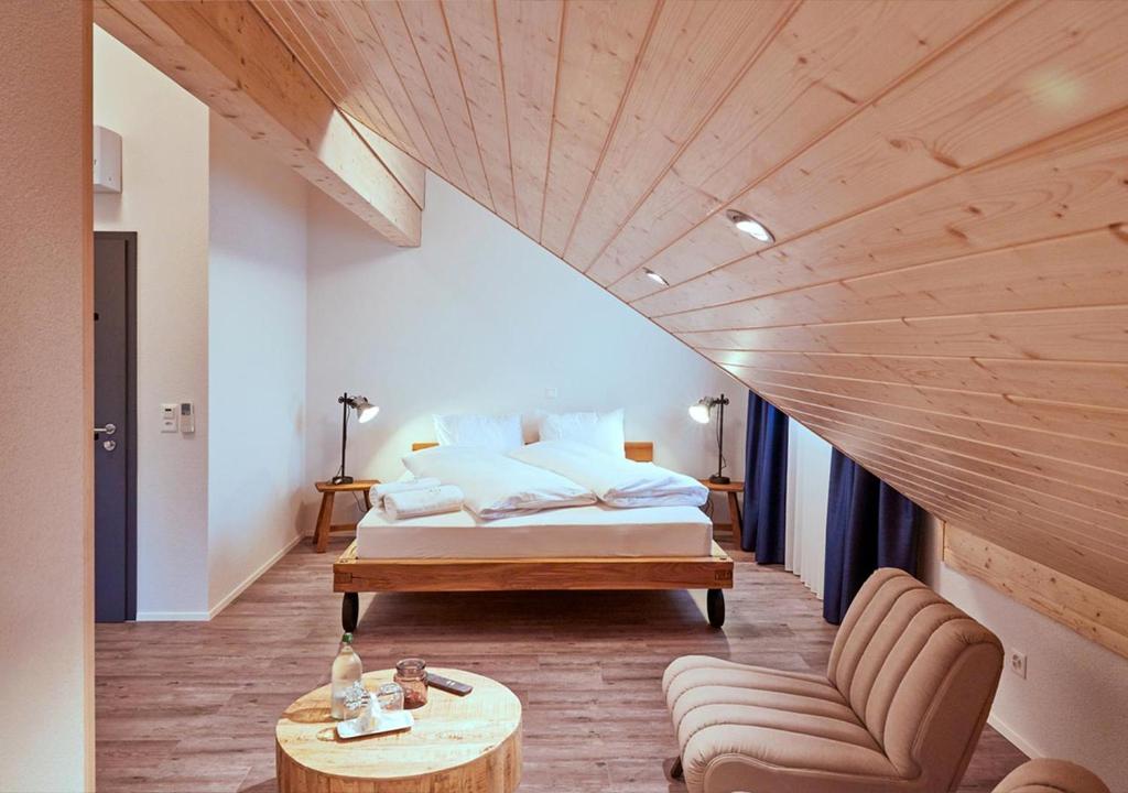 Postel nebo postele na pokoji v ubytování Auberge Passepartout