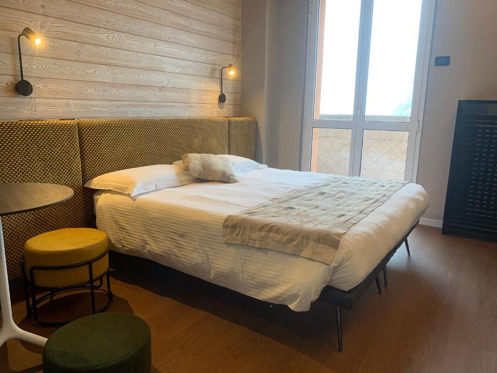 Postel nebo postele na pokoji v ubytování Albergo Moderno & Spa