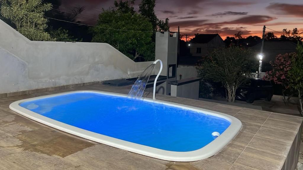 Бассейн в Casa Veraneio próximo a lagoa или поблизости