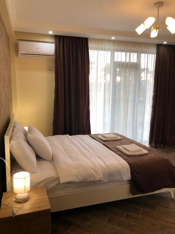 Postel nebo postele na pokoji v ubytování White-House