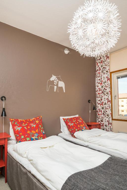 Postel nebo postele na pokoji v ubytování Hotell Fridhemsgatan
