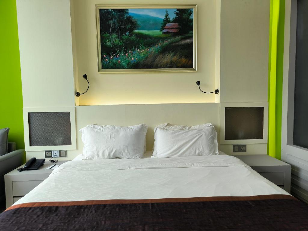 Katil atau katil-katil dalam bilik di Meritz Hotel