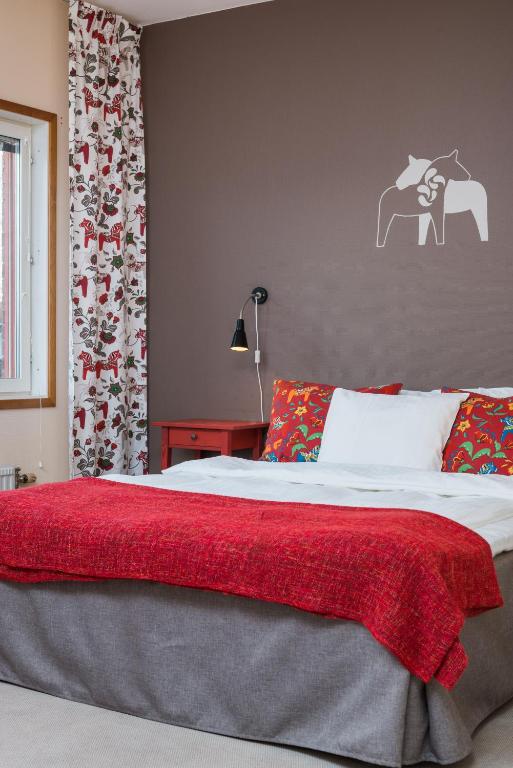 Postel nebo postele na pokoji v ubytování Hotell Fridhemsgatan