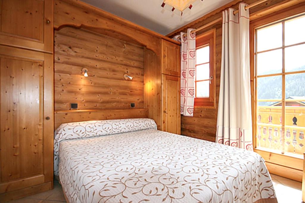 Postel nebo postele na pokoji v ubytování Appartement moderne à Châtel 60 m² avec terrasse privée