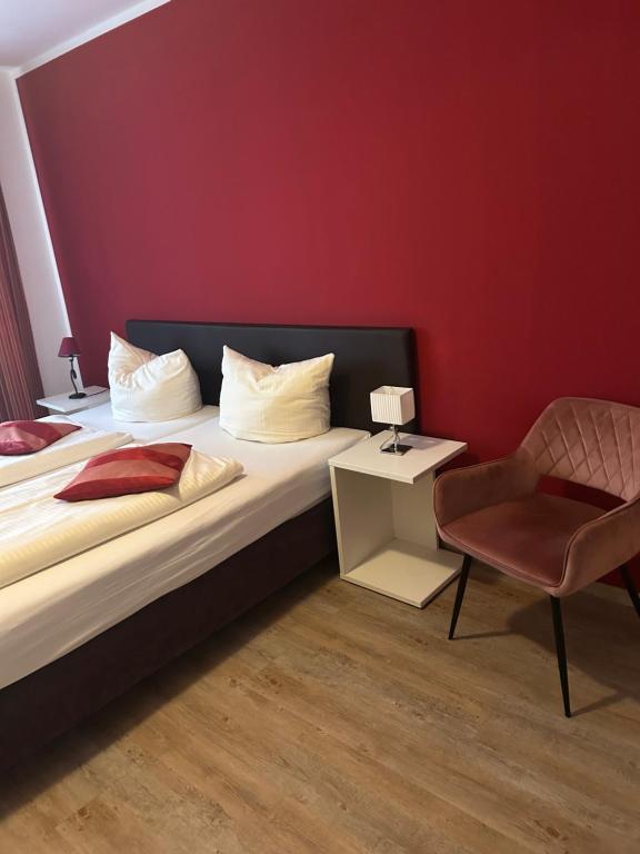 Postel nebo postele na pokoji v ubytování Hotel Pension Haydn