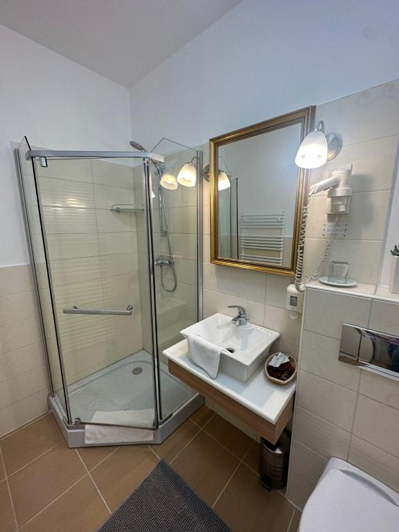 Koupelna v ubytování Hotel Forras