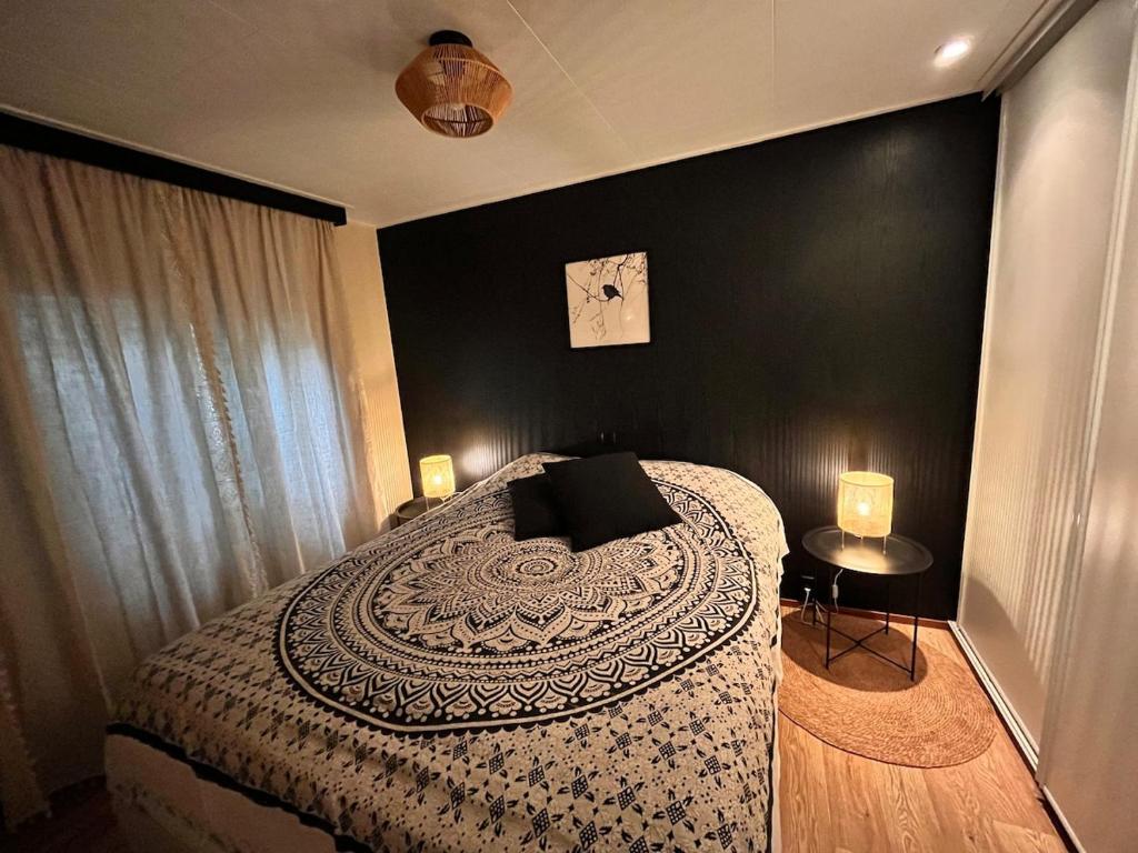 Voodi või voodid majutusasutuse 't Tjilpplekje, 4-persoons chalet met privé hottub toas