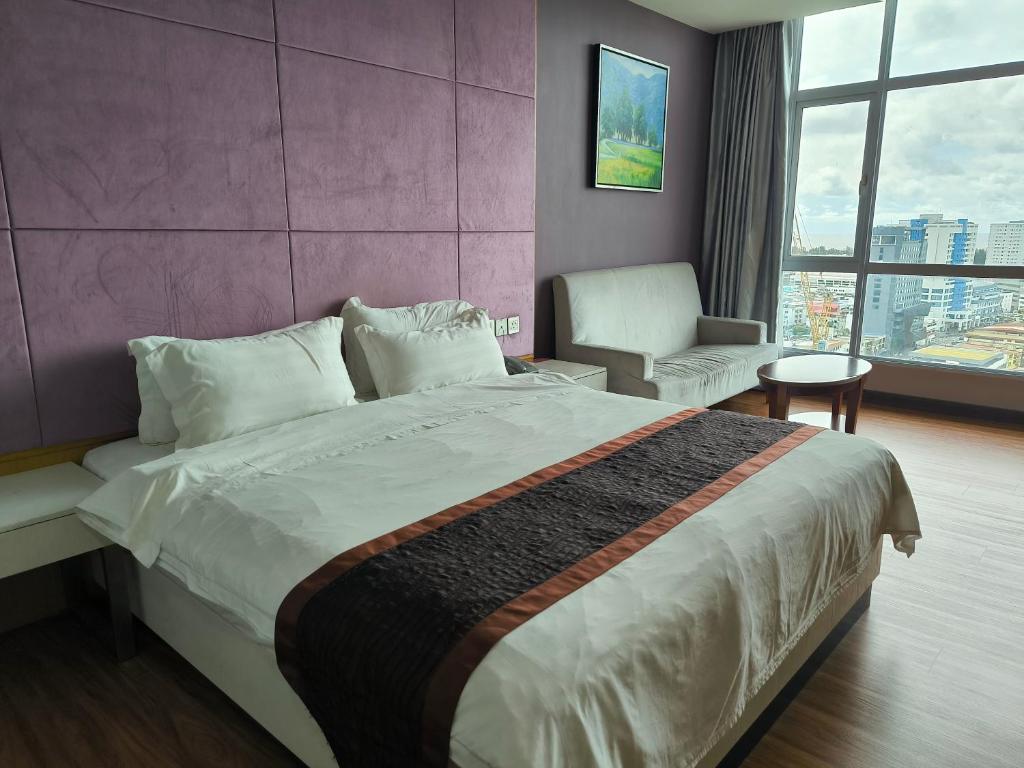 Katil atau katil-katil dalam bilik di Meritz Hotel