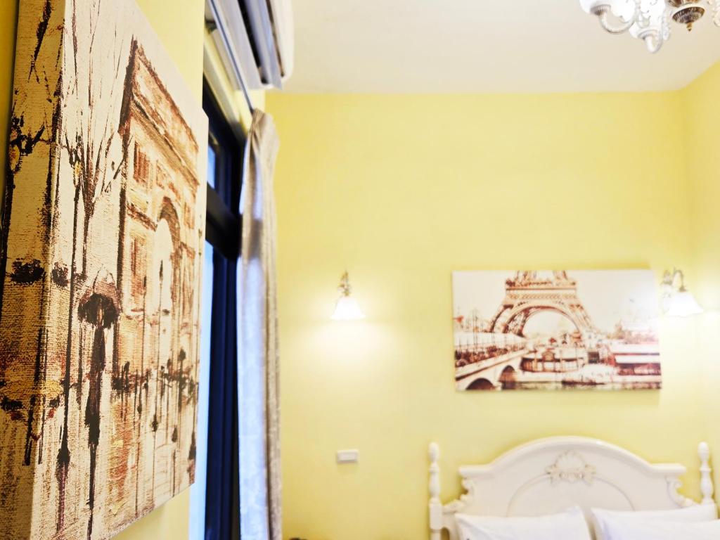 Letto o letti in una camera di Lancasa Taitung
