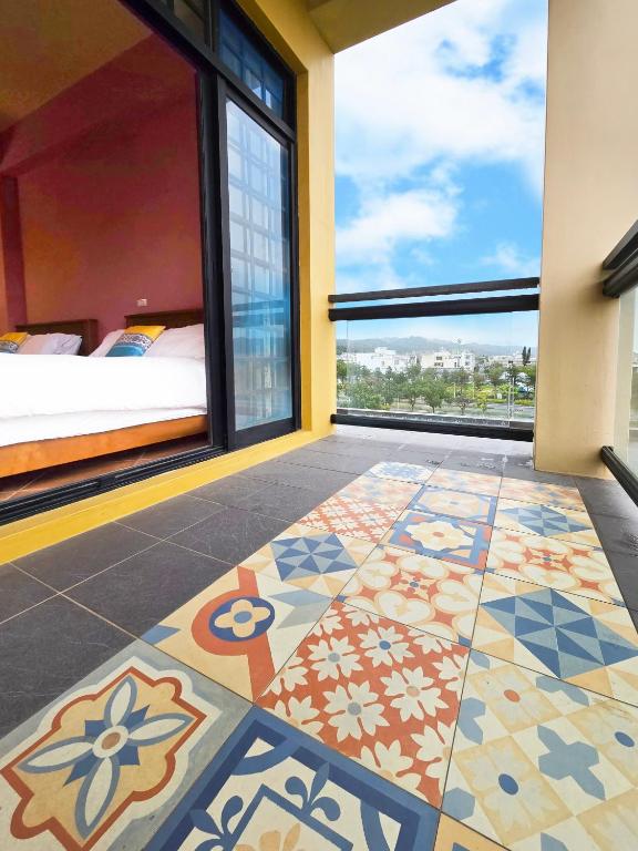 Letto o letti in una camera di Lancasa Taitung