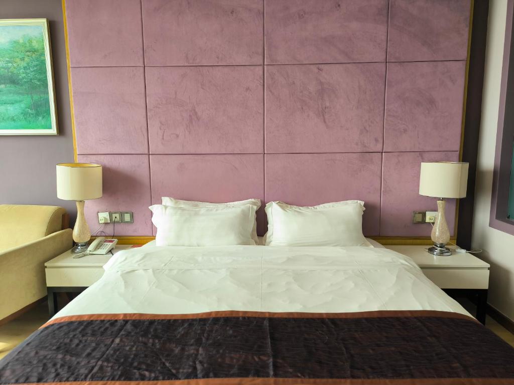 Katil atau katil-katil dalam bilik di Meritz Hotel