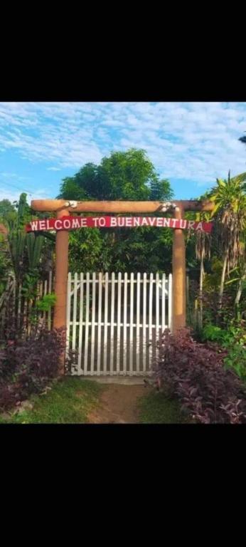 a gate with a sign that reads welcome to bulvisor at Buenaventura Beachresort in Nauhang
