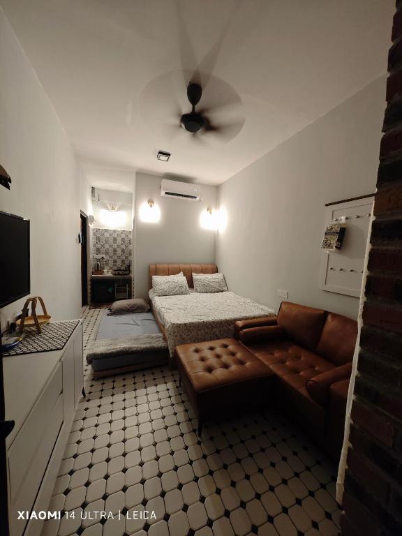 Postel nebo postele na pokoji v ubytování Red Brick Atelier