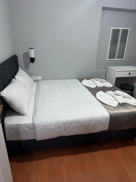 Postel nebo postele na pokoji v ubytování Galley Port Hotel