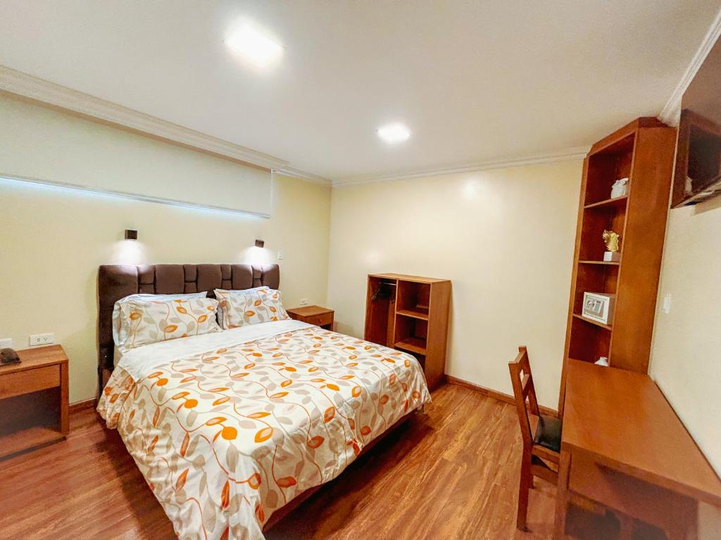 Postel nebo postele na pokoji v ubytování Hotel David