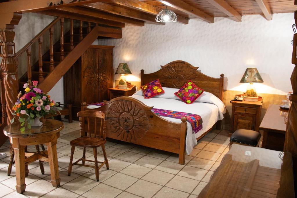 Postel nebo postele na pokoji v ubytování Hotel Los Escudos