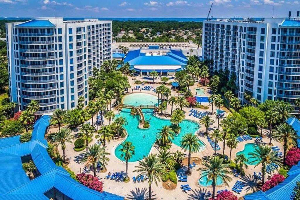 an aerial view of the pool at the resort at 5 Star Resort 11th Fl Stunning Sunrise 2BR 2BA King Suite,Pools ,Shuttle or Walk to Beach in Destin