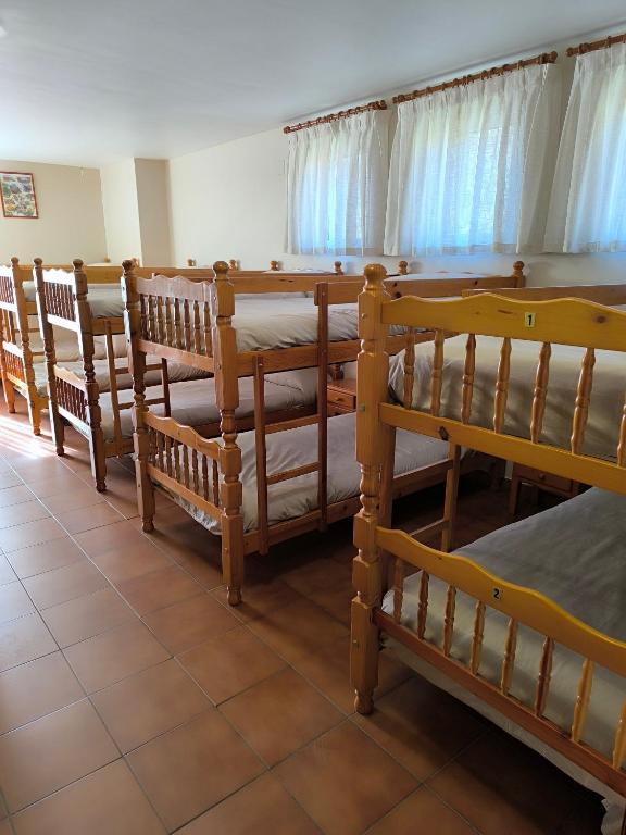 Postel nebo postele na pokoji v ubytování Albergue Turístico Briz