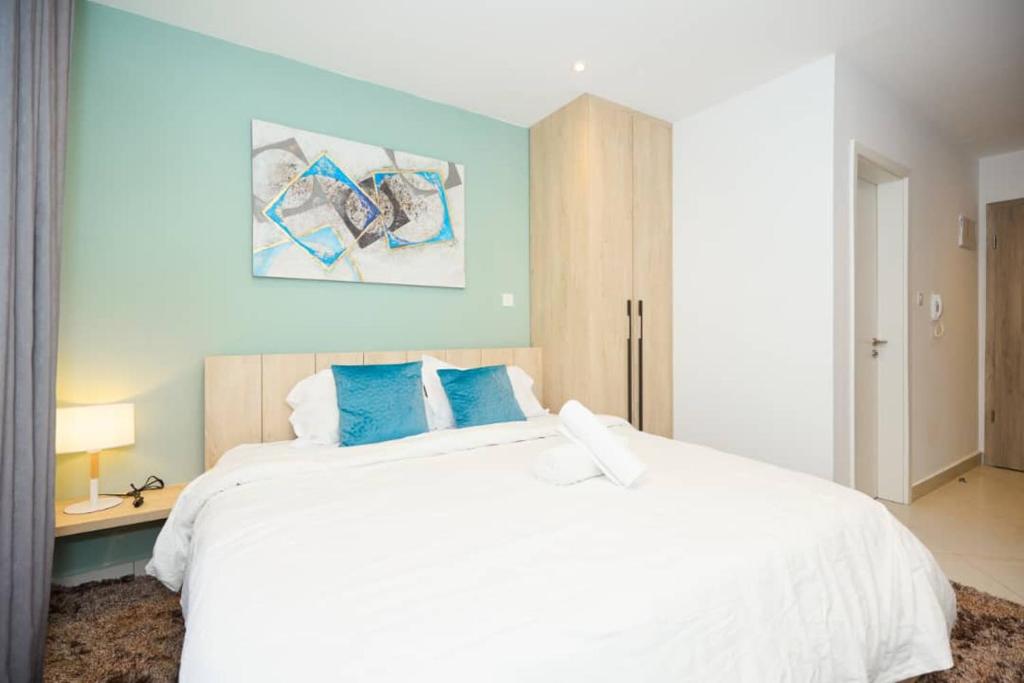 Ένα ή περισσότερα κρεβάτια σε δωμάτιο στο Unique Skyline Apartments