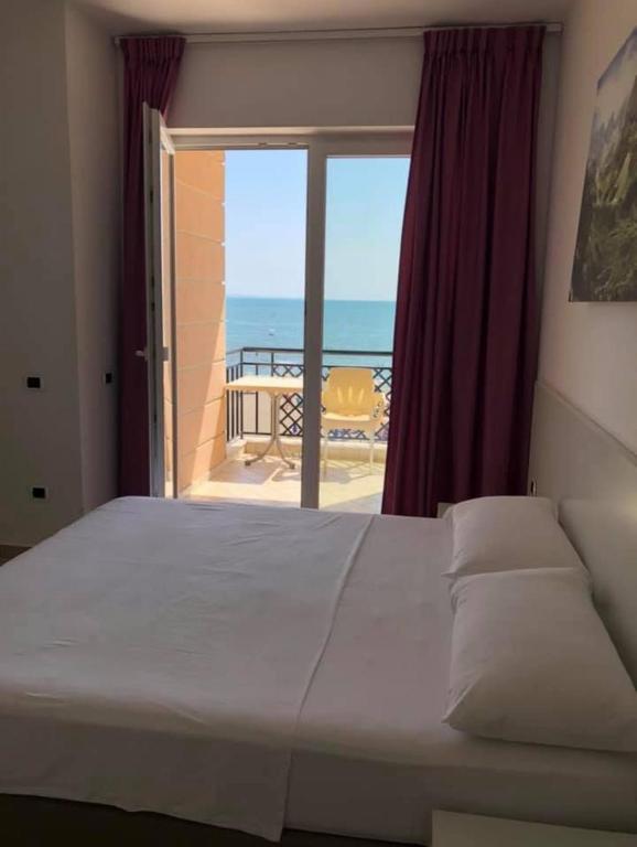 Postel nebo postele na pokoji v ubytování Hotel Brilant