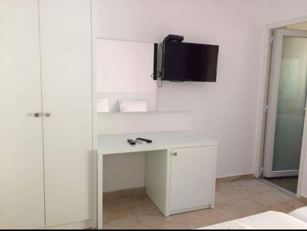 TV a/nebo společenská místnost v ubytování Hotel Brilant