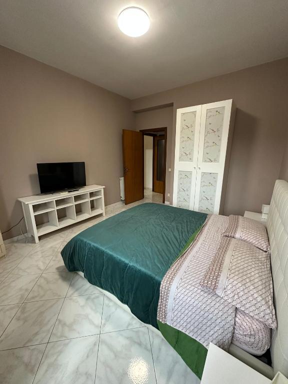 A bed or beds in a room at La casa del sole