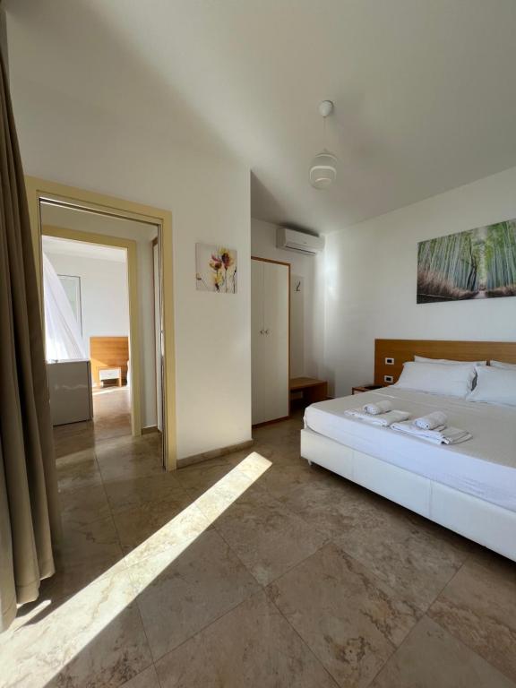 Postel nebo postele na pokoji v ubytování Hotel Brilant