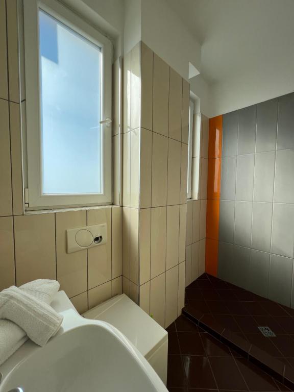 Postel nebo postele na pokoji v ubytování Hotel Brilant
