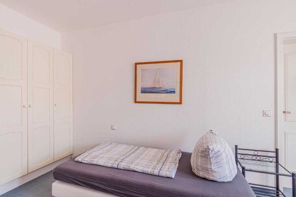 Postel nebo postele na pokoji v ubytování Pension für Monteure in Dresden, Zimmer mit eigenem Bad und großer Gemeinschaftsküche