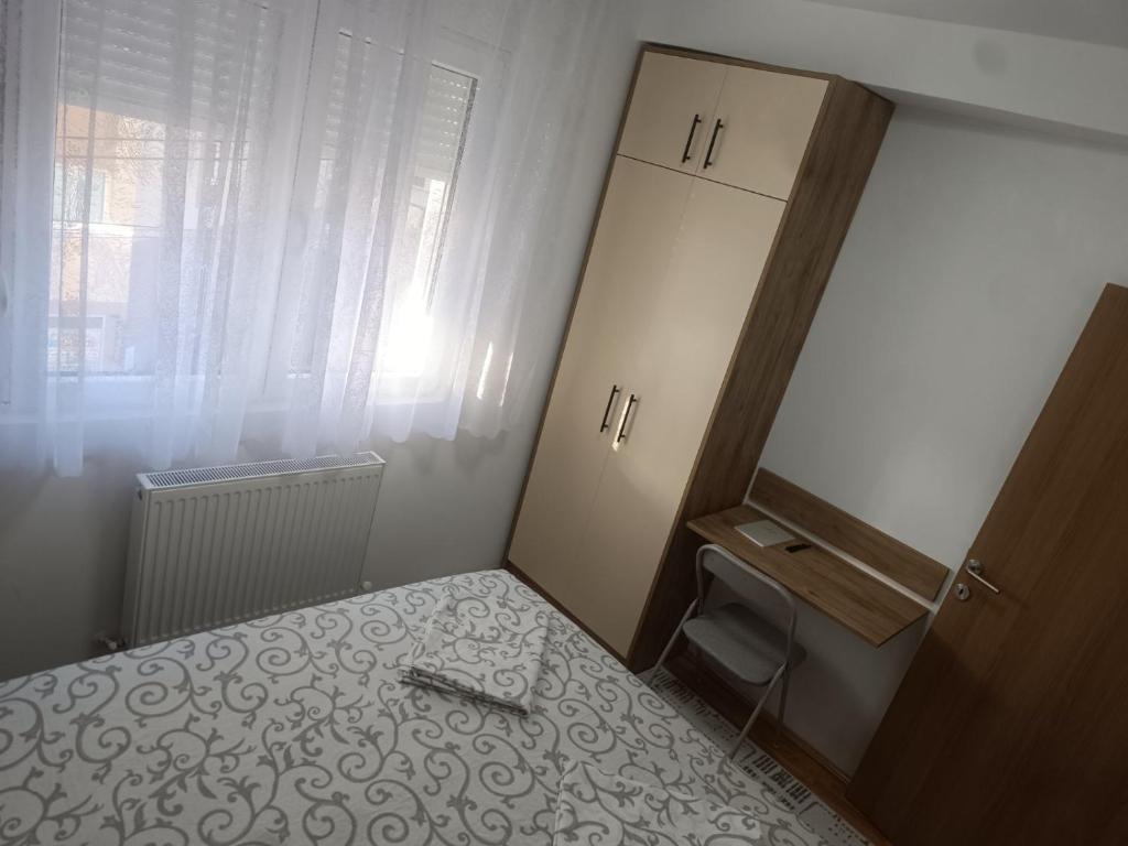 Postel nebo postele na pokoji v ubytování Apartman Dunja i Petar