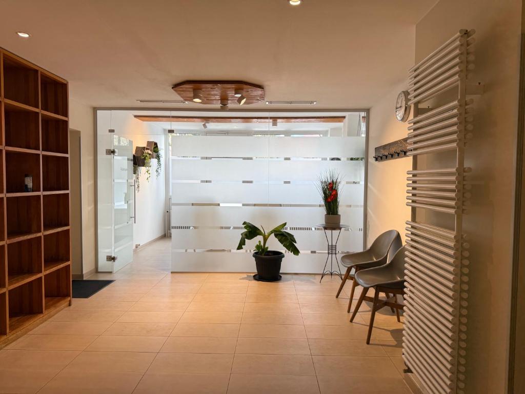 Posezení v ubytování FeWo Pool, Sauna, Wellness, Gartenterrasse ENGELMEER