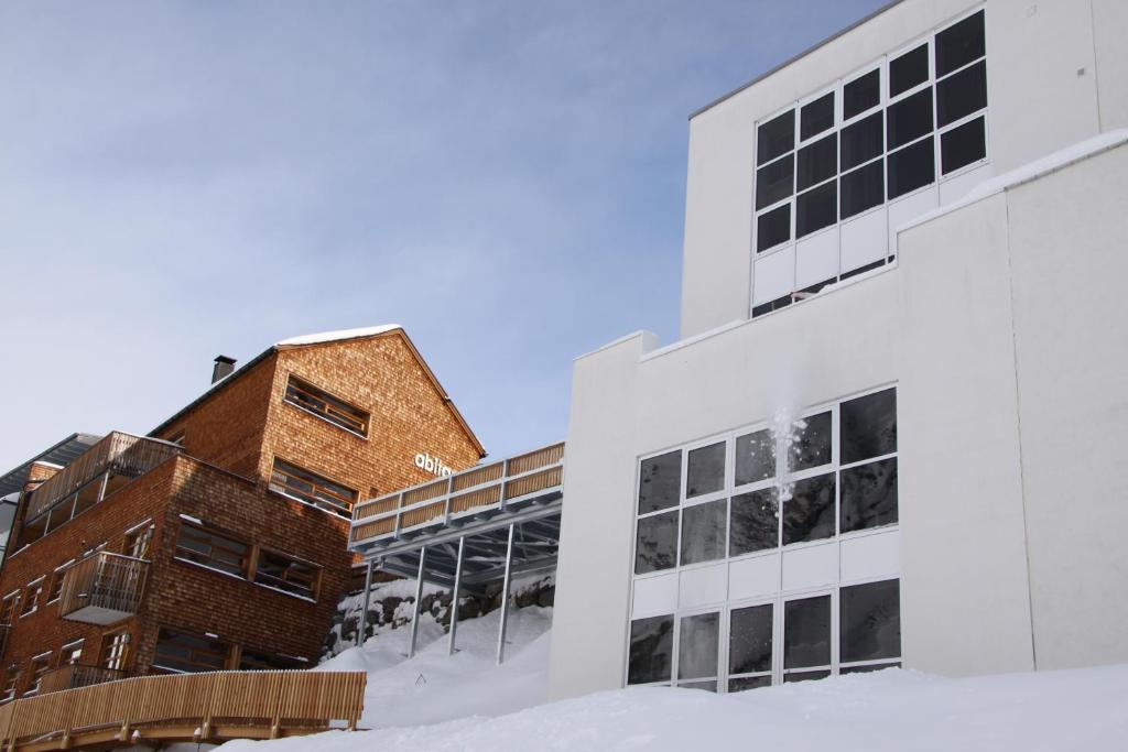 an office building with snow on the ground at Appartement Elmar in Obergurgl