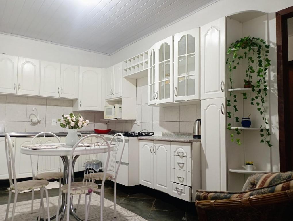 Kuchyň nebo kuchyňský kout v ubytování Espaço inteiro - LOFT confortavel