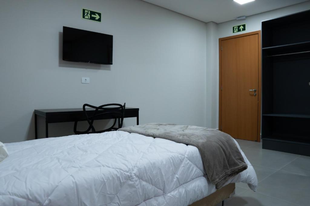 Postel nebo postele na pokoji v ubytování Dicopi Hotel