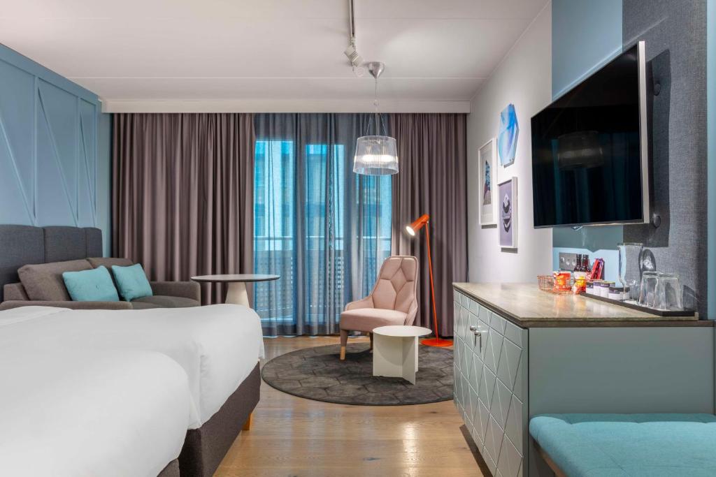TV a/nebo společenská místnost v ubytování Radisson Blu Scandinavia Hotel, Göteborg