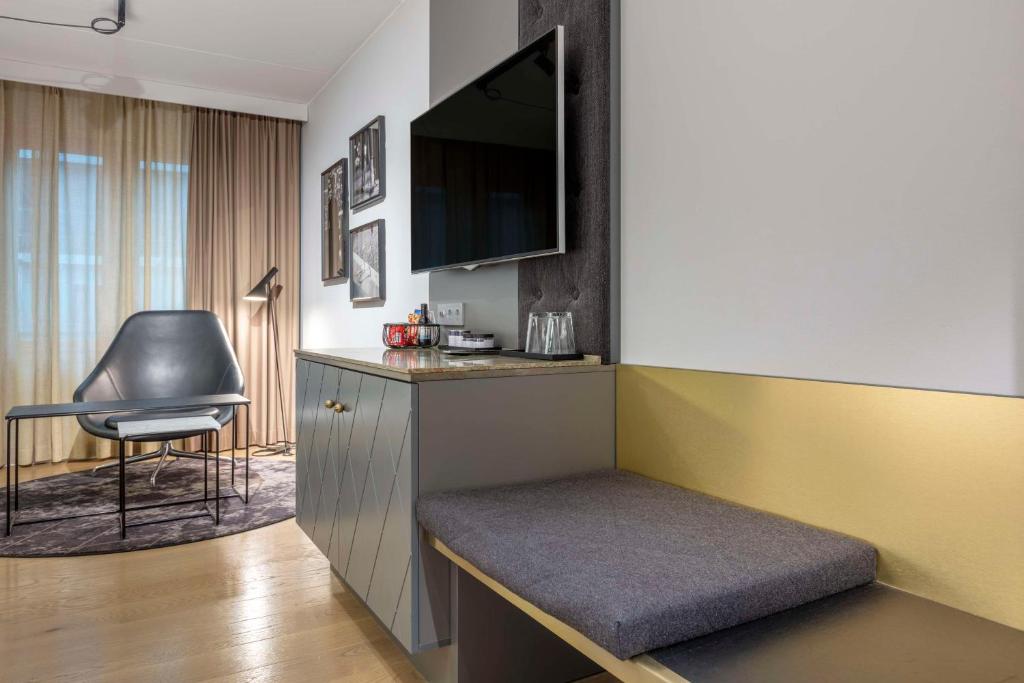 TV a/nebo společenská místnost v ubytování Radisson Blu Scandinavia Hotel, Göteborg