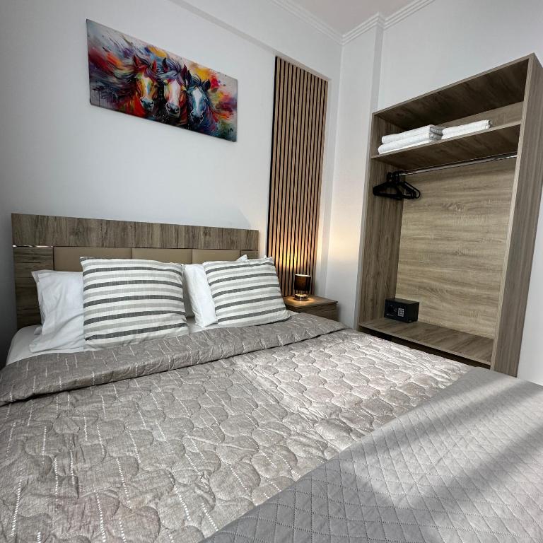 Postel nebo postele na pokoji v ubytování R&T Apartments