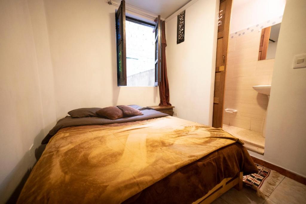 Postel nebo postele na pokoji v ubytování Casa Tsao