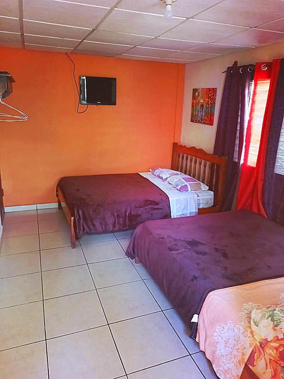 Postel nebo postele na pokoji v ubytování Hostal Beiro