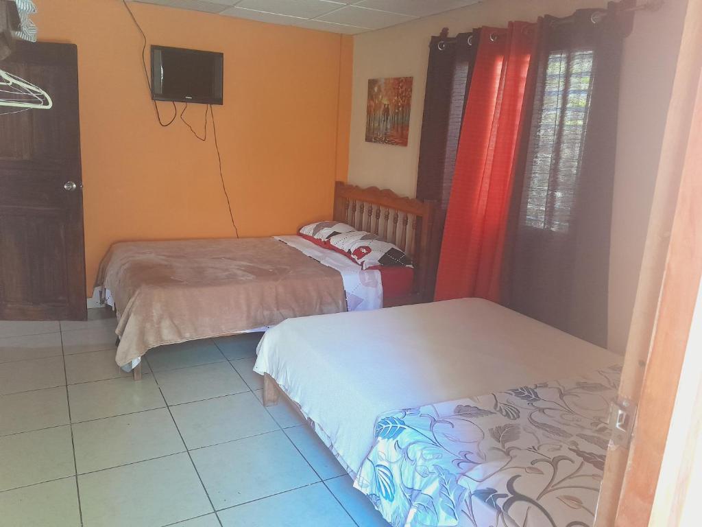 Postel nebo postele na pokoji v ubytování Hostal Beiro