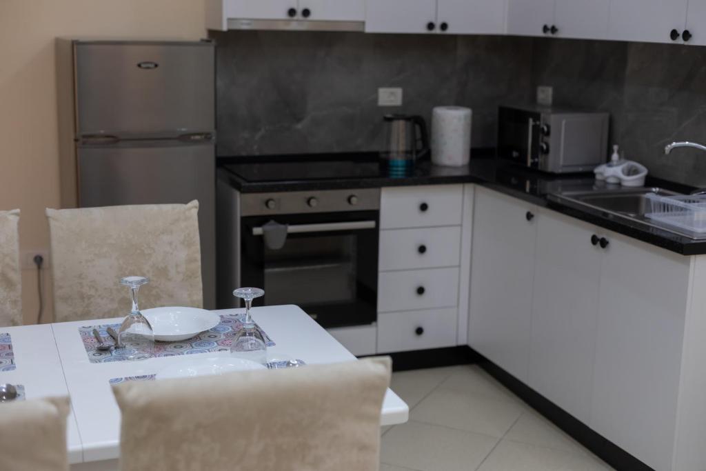 Kuchyň nebo kuchyňský kout v ubytování Vila Emi Apartment's