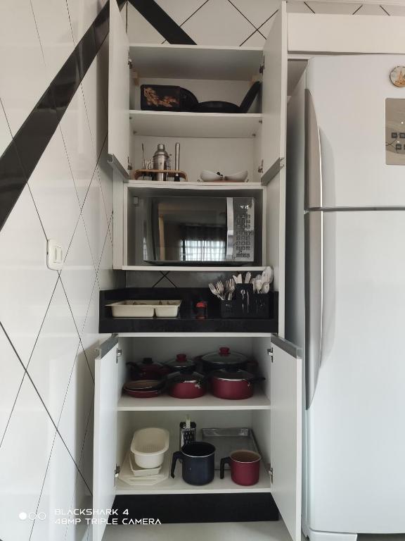Kuchyň nebo kuchyňský kout v ubytování Casa Térrea 3 quartos, sendo 1 suíte Maringá