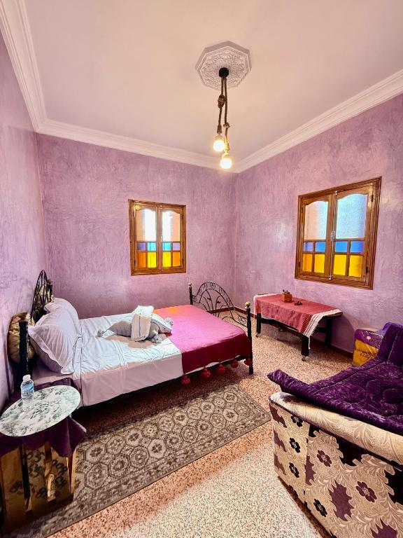 Postel nebo postele na pokoji v ubytování Maison Face au lion