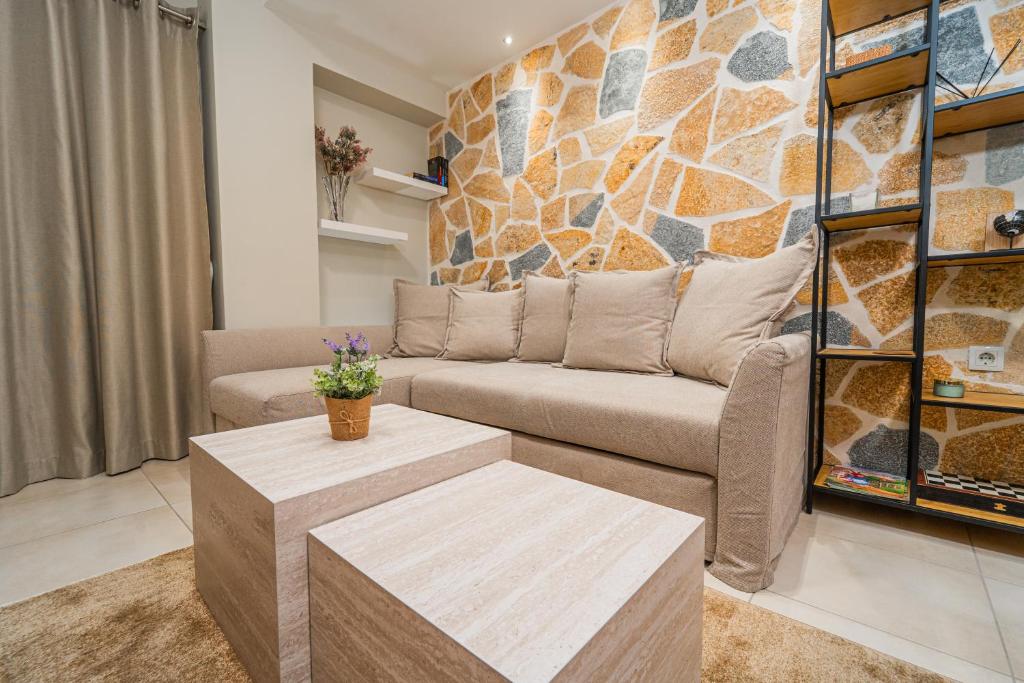 a living room with a couch and a table at Ioannina Center Apartment in Ioannina