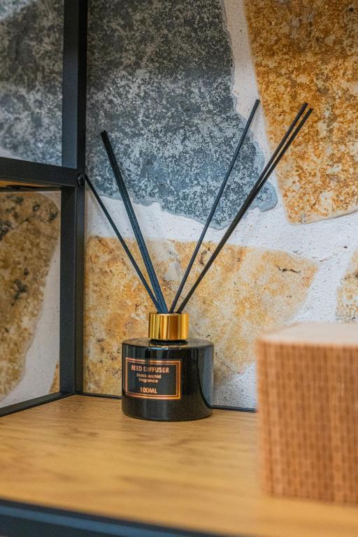 a black and gold trophy sitting on top of a table at Ioannina Center Apartment in Ioannina