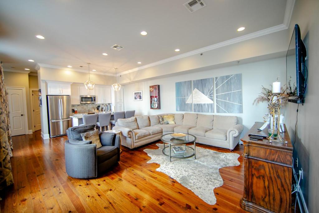 a living room with a couch and a table at The Frenchman 2bed - 2 bath in New Orleans