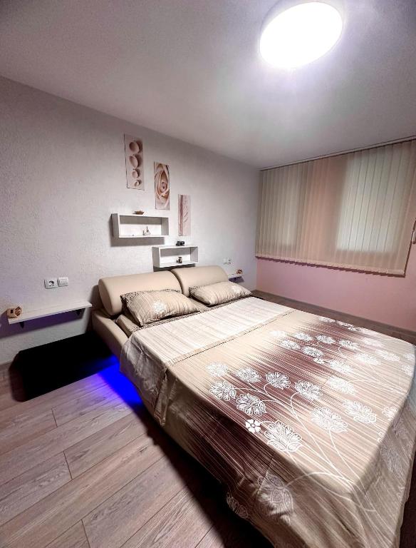 a bedroom with a large bed in a room at Emanuela Sea And Luxury in Kavala