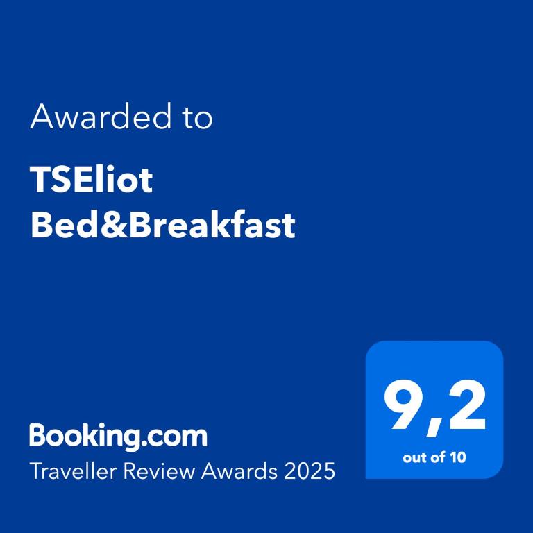 a blue text box with the words upgraded to kettleott bed and breakfast at TSEliot Bed&Breakfast in Banfield