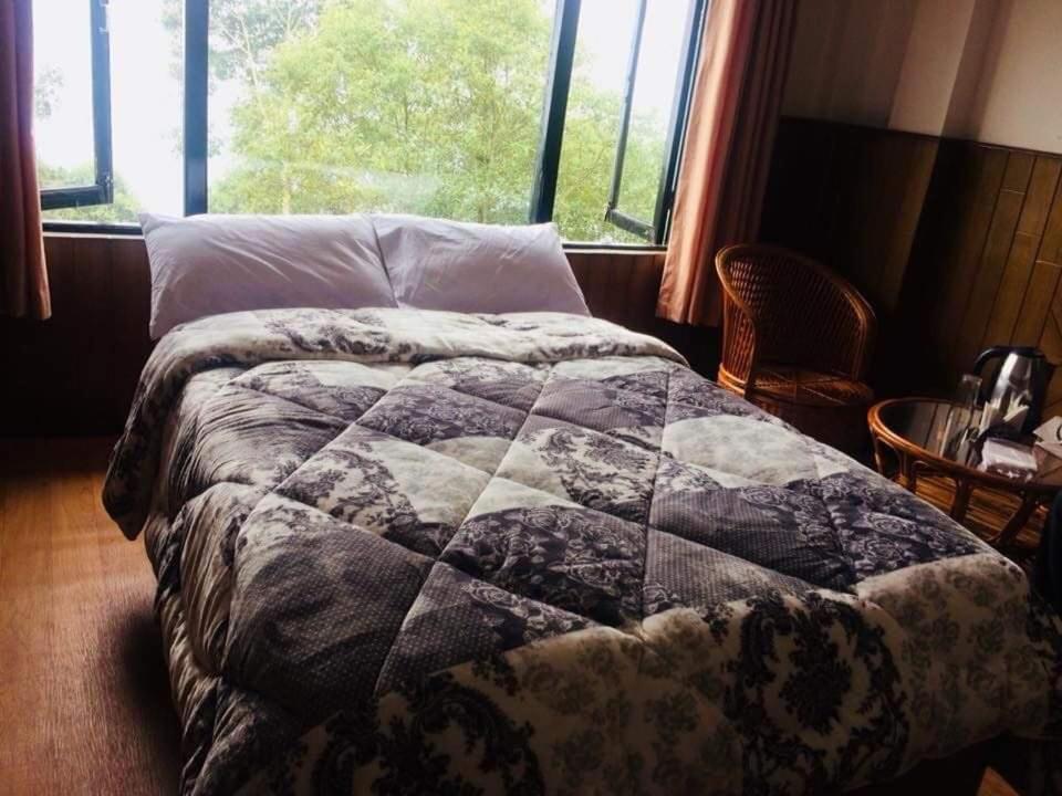 Voodi või voodid majutusasutuse Hotel Elephant toas